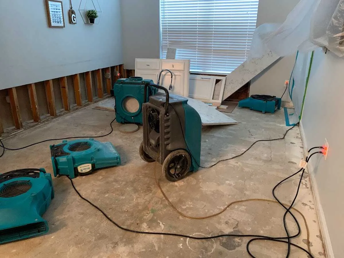 Dehumidifier in flood-cut room for Water Damage Restoration in Bangor Base